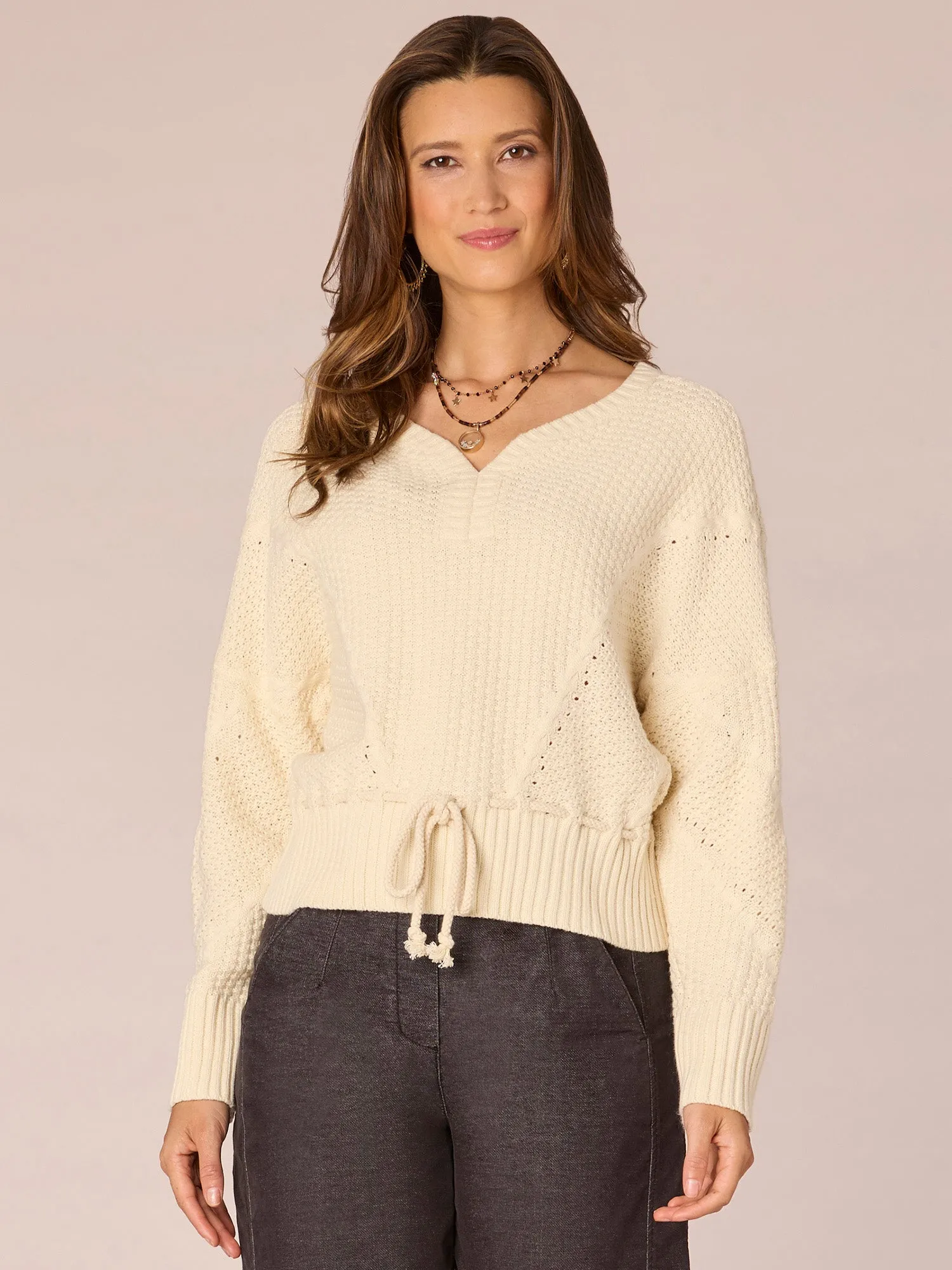 Long Dolman Sleeve V-Neck Peplum Hem Sweater with Tie Front